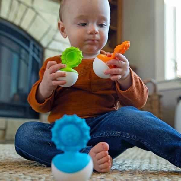 Прорізувач-неваляшка Fat Brain Toys dimpl wobl помаранчевий (F2172ML) kidis_13687 фото