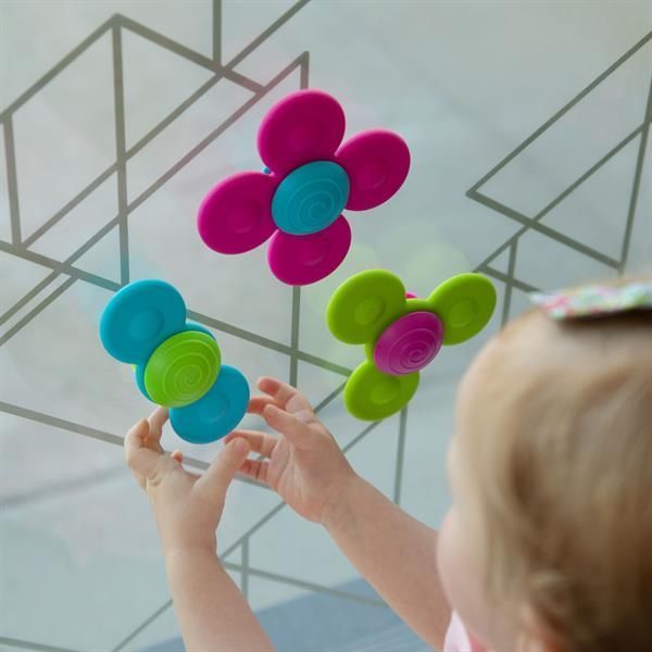 Набір прорізувачів-спінерів із присосками Fat Brain Toys Whirly Squigz 3 шт. (F210ML) kidis_13655 фото